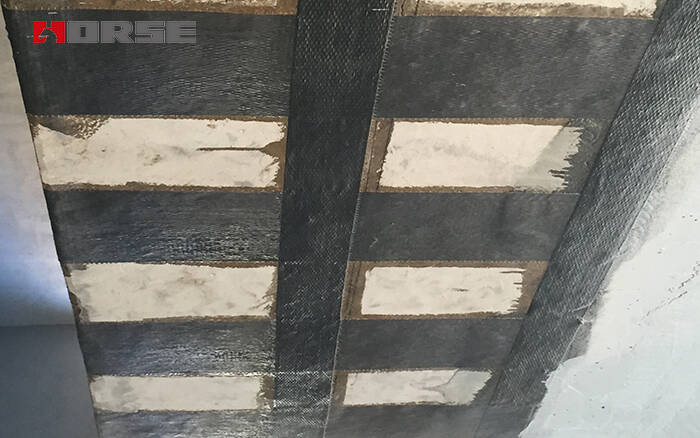 Beam strengthening by carbon fiber wrapping