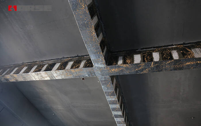 CFRP sheets for flexural strengthening of RC beams