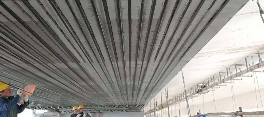 Prestressed carbon fiber plate reinforcement