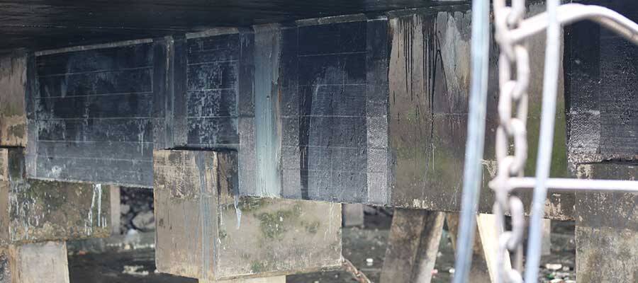 Carbon fiber fabric reinforcement for concrete wharf 