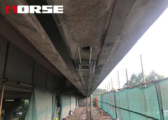 Prestressed-Carbon-Fiber-Plate-To-Strengthen-The-Bridge-T-Beam.jpg